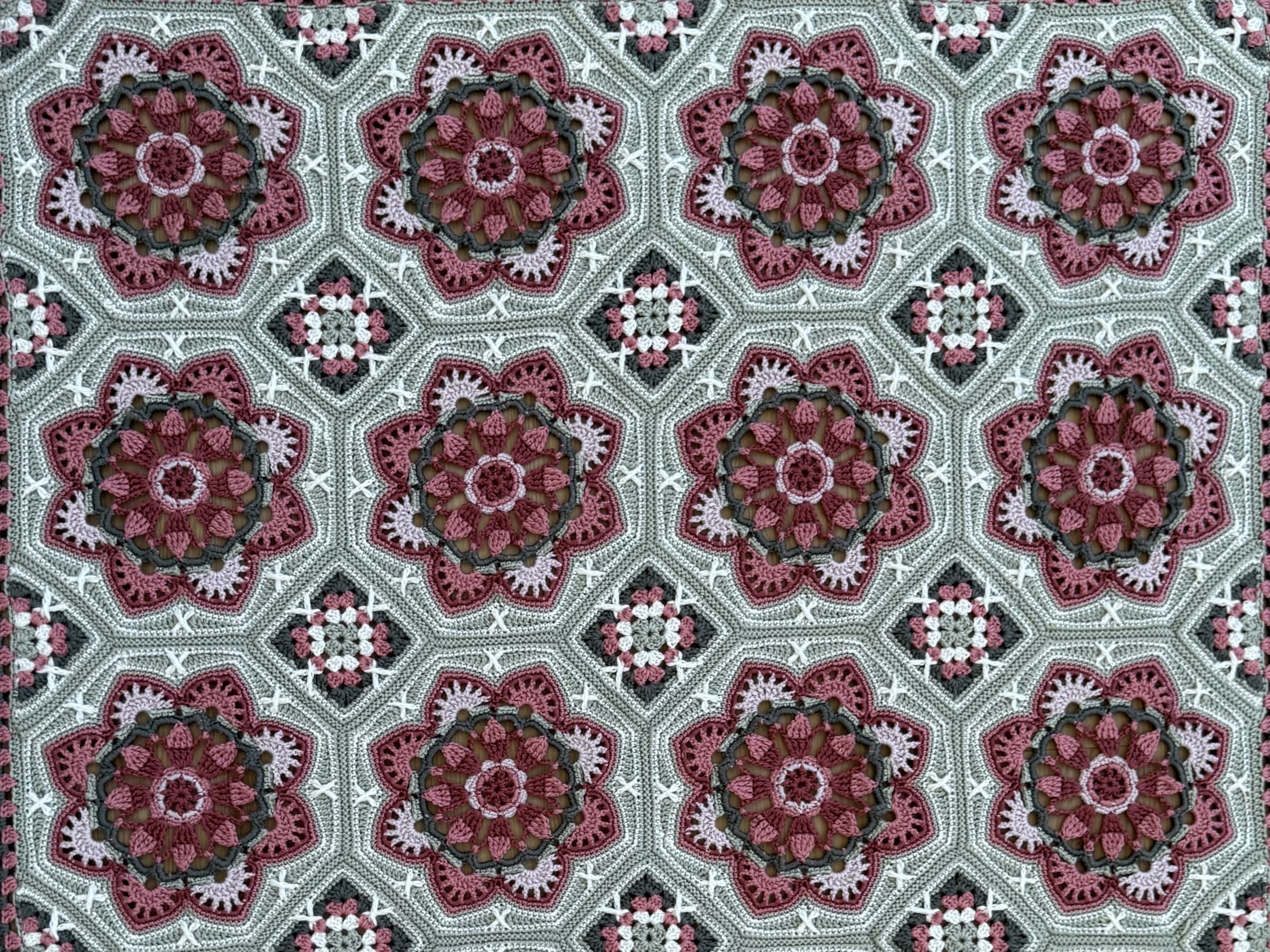Finished handmade crochet blanket and comfort items